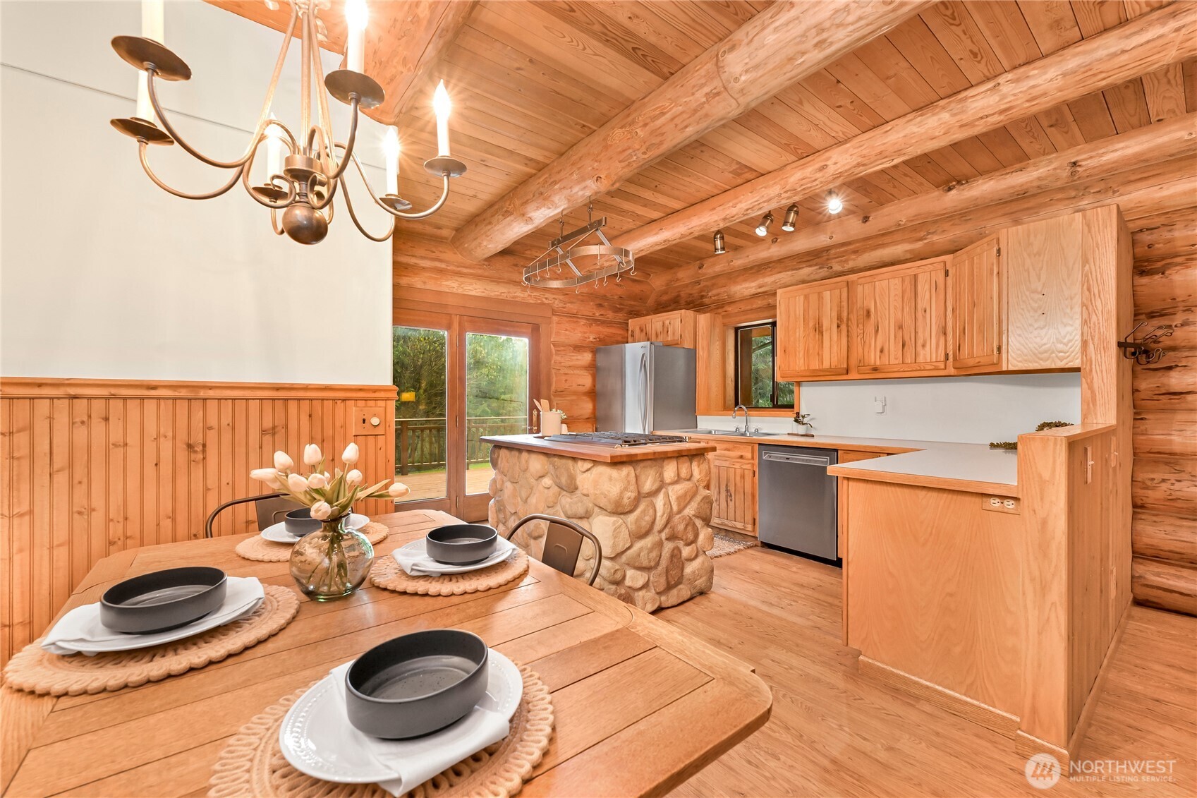 498 Summerland Road Bellingham, WA 98229 - Photo 12 of 40 a kitchen with a table and chairs in it