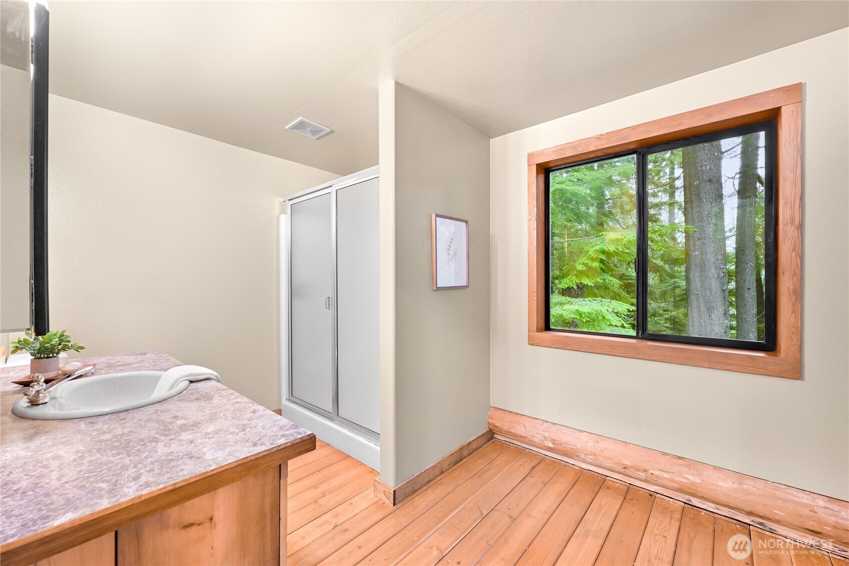 498 Summerland Road Bellingham, WA 98229 - Photo 21 of 40 a bathroom with a granite countertop sink and a mirror