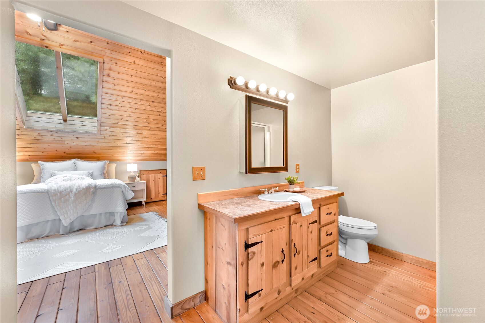 498 Summerland Road Bellingham, WA 98229 - Photo 22 of 40 a bathroom with a sink and a mirror
