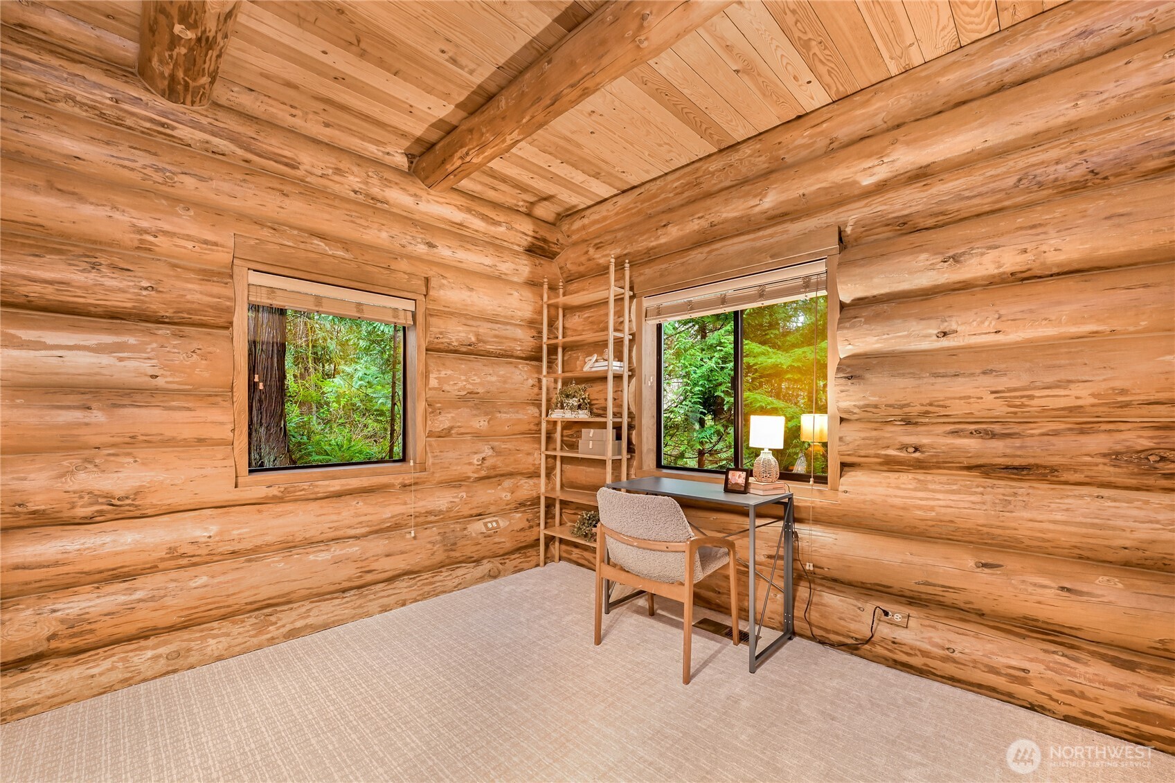 498 Summerland Road Bellingham, WA 98229 - Photo 27 of 40 a view of a room with a large window and sitting area
