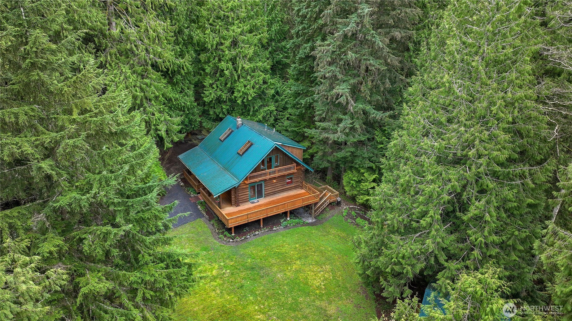 498 Summerland Road Bellingham, WA 98229 - Photo 32 of 40 a view of a backyard with sitting area
