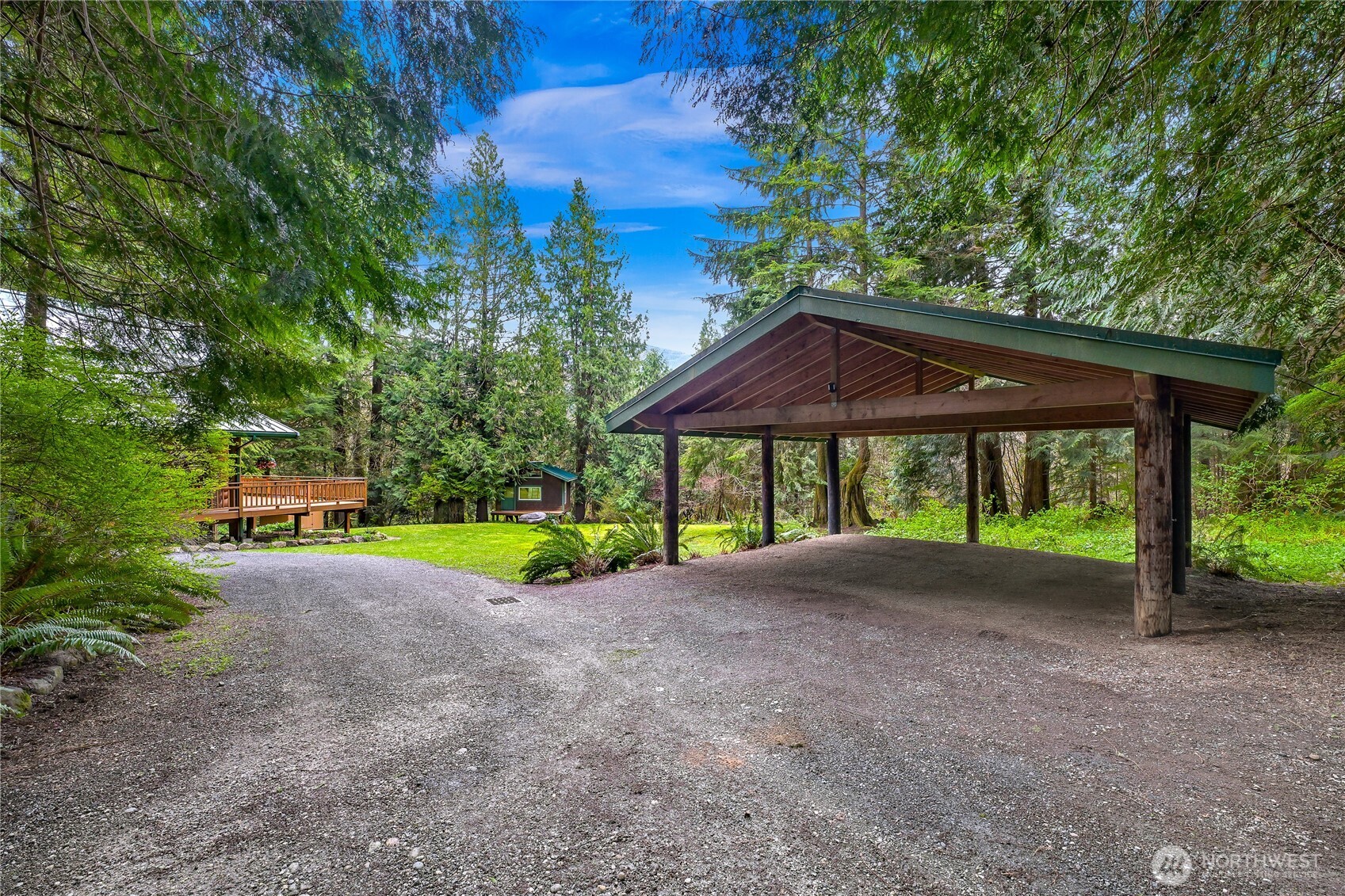 498 Summerland Road Bellingham, WA 98229 - Photo 36 of 40 a view of a house with porch and garden