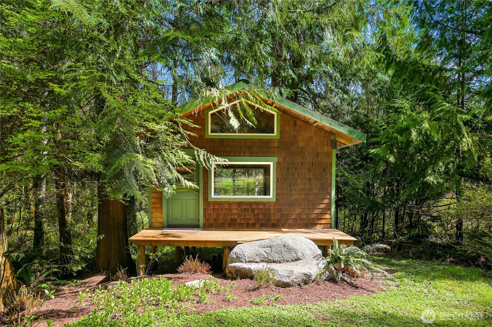 498 Summerland Road Bellingham, WA 98229 - Photo 6 of 40 a front view of a house with garden