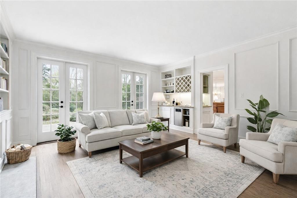 956 West Wesley Road Northwest Atlanta, GA 30327 - Photo 16 of 49 a living room with furniture and a large window