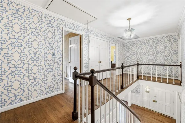 a view of entryway with wooden floor