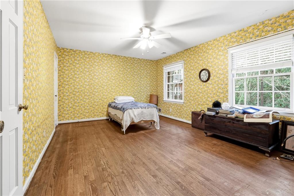 956 West Wesley Road Northwest Atlanta, GA 30327 - Photo 33 of 49 a living room with furniture and a large window