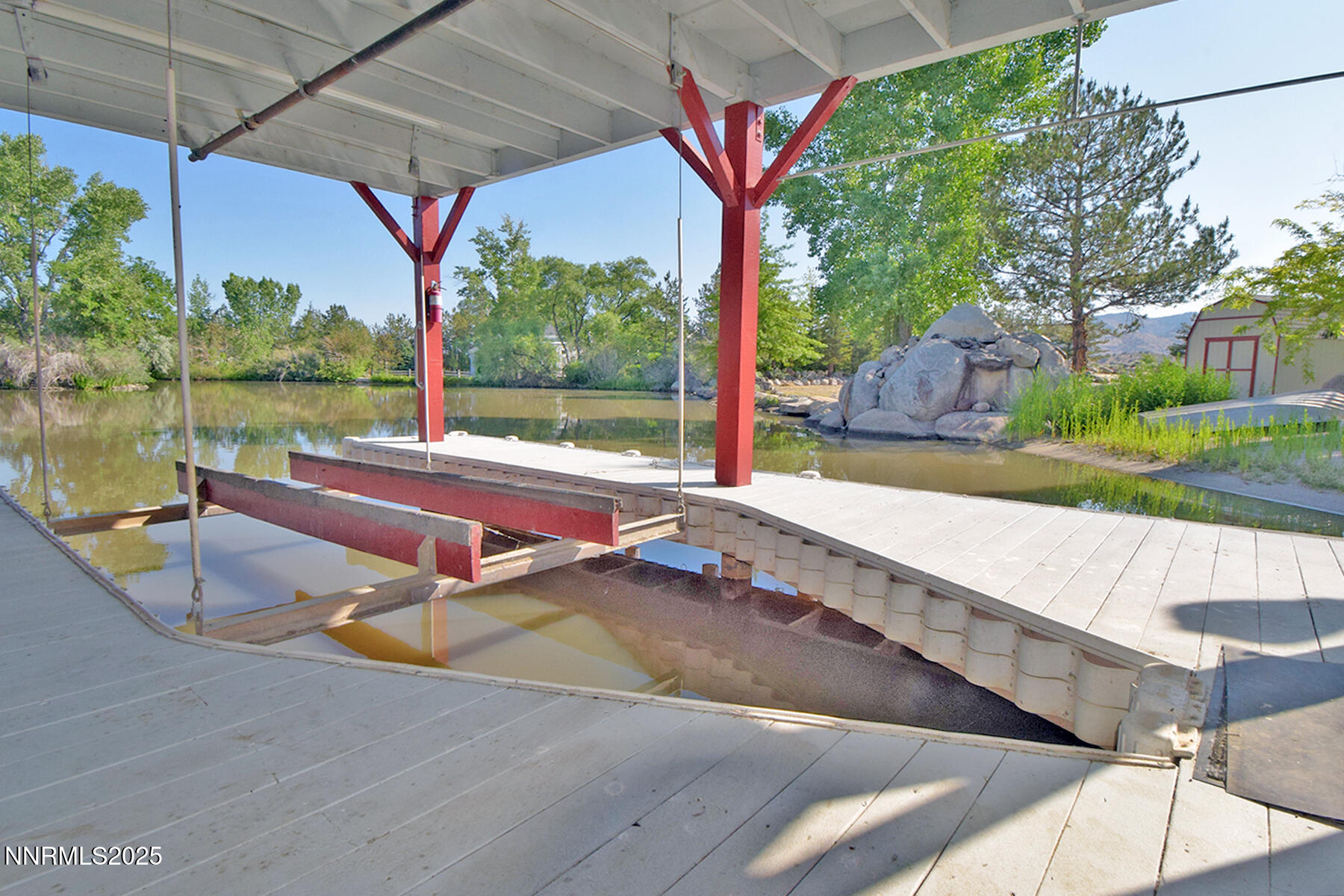 95 Hidden Lake Drive Reno, NV 89521 - Photo 16 of 43 a view of a chairs and table in the patio