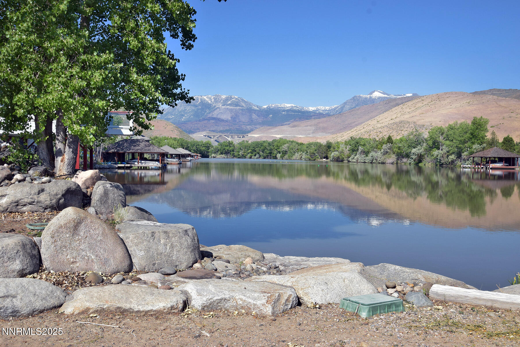 95 Hidden Lake Drive Reno, NV 89521 - Photo 18 of 43 a view of a lake with a mountain