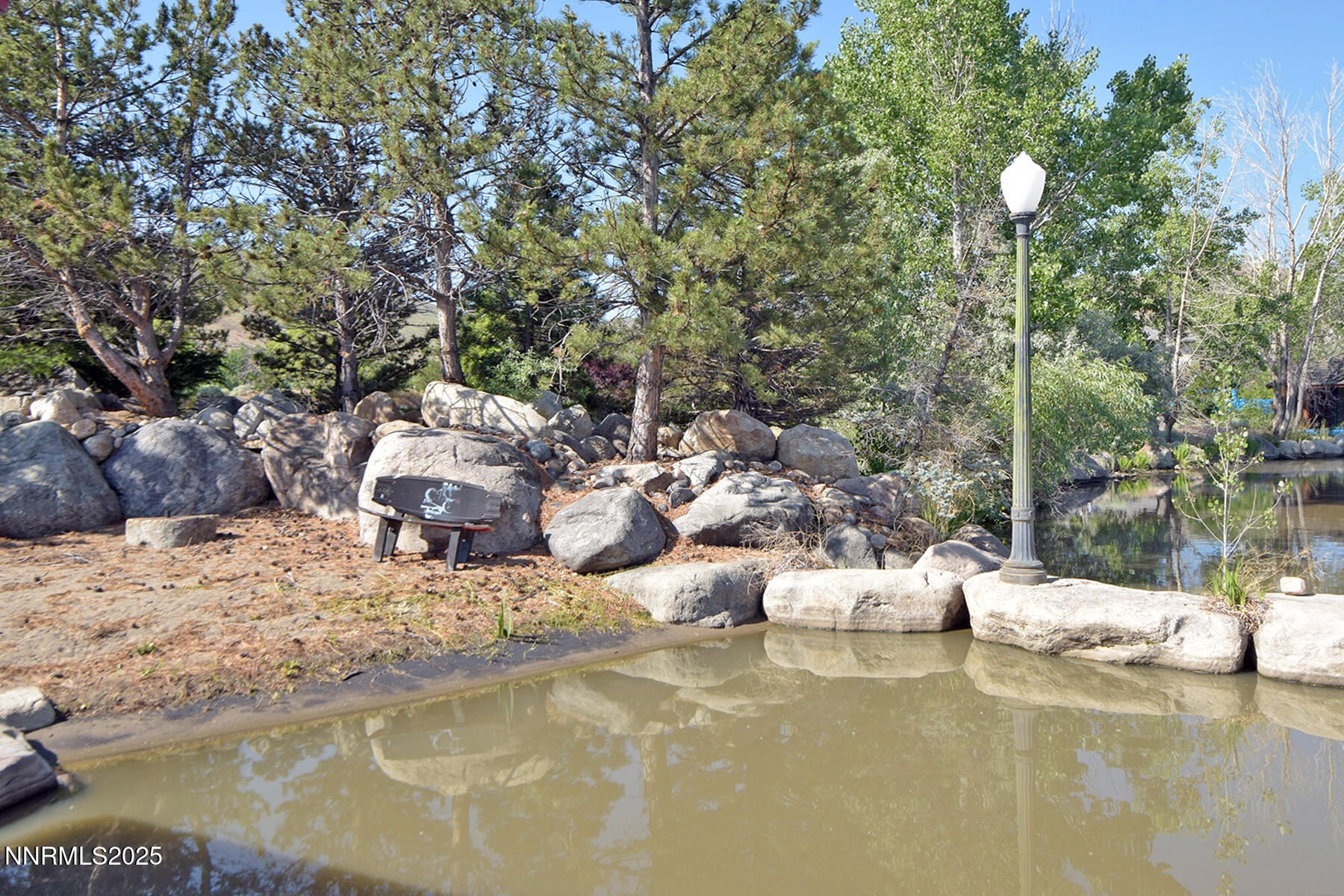 95 Hidden Lake Drive Reno, NV 89521 - Photo 20 of 43 a view of a patio with swimming pool and sitting area