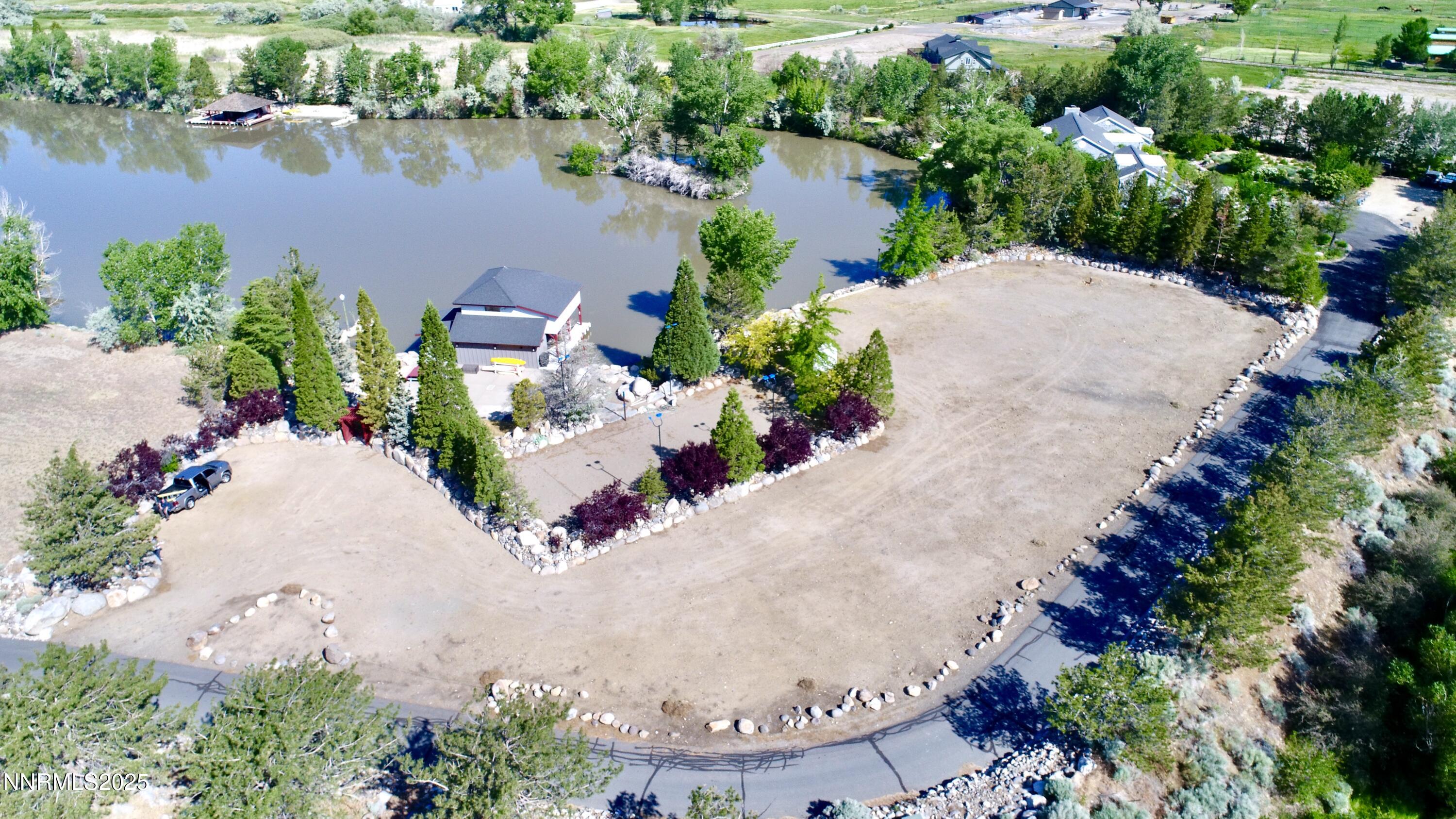 95 Hidden Lake Drive Reno, NV 89521 - Photo 22 of 43 an aerial view of a house with a yard and a garden