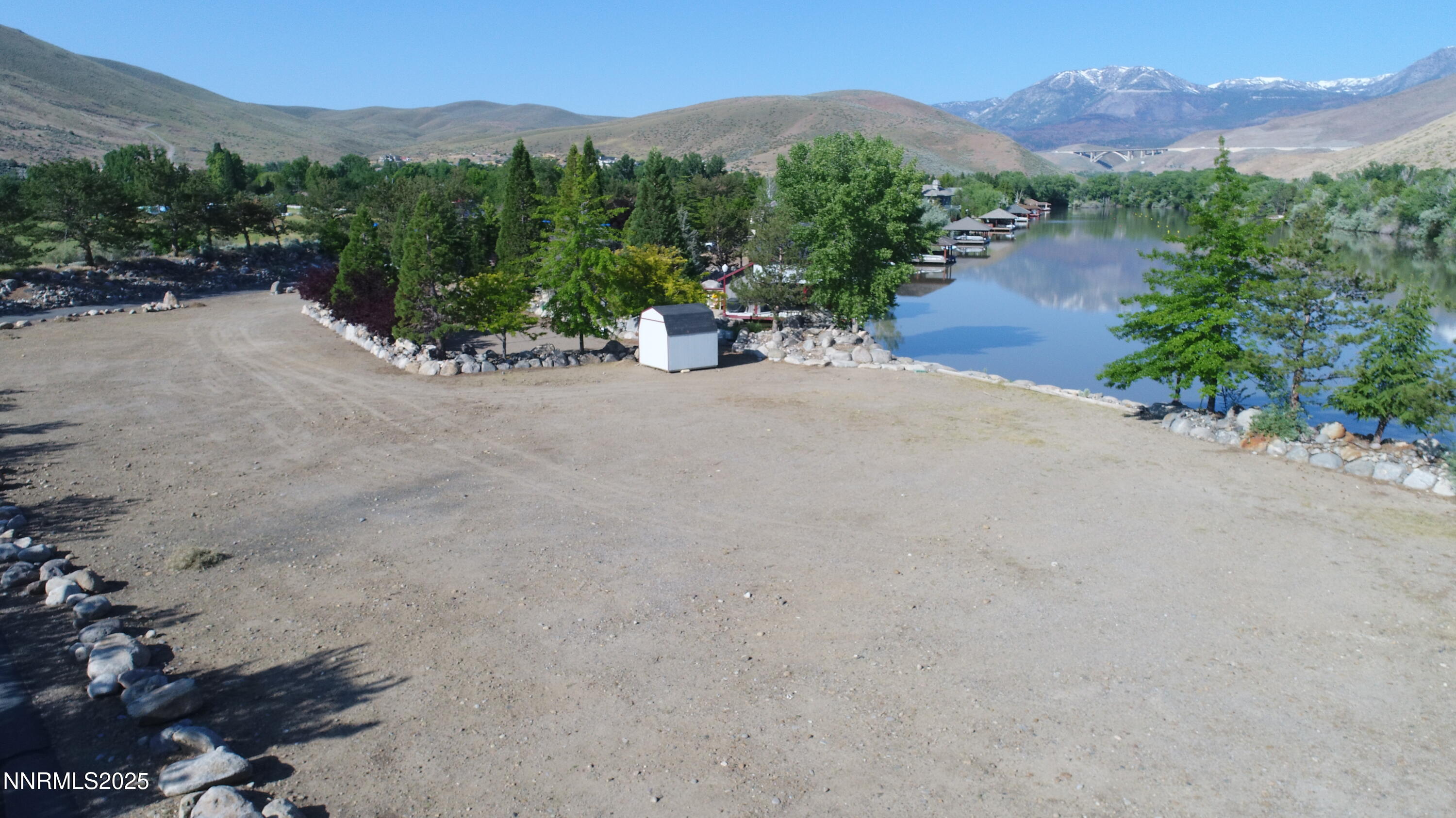 95 Hidden Lake Drive Reno, NV 89521 - Photo 23 of 43 a view of a lake with a mountain
