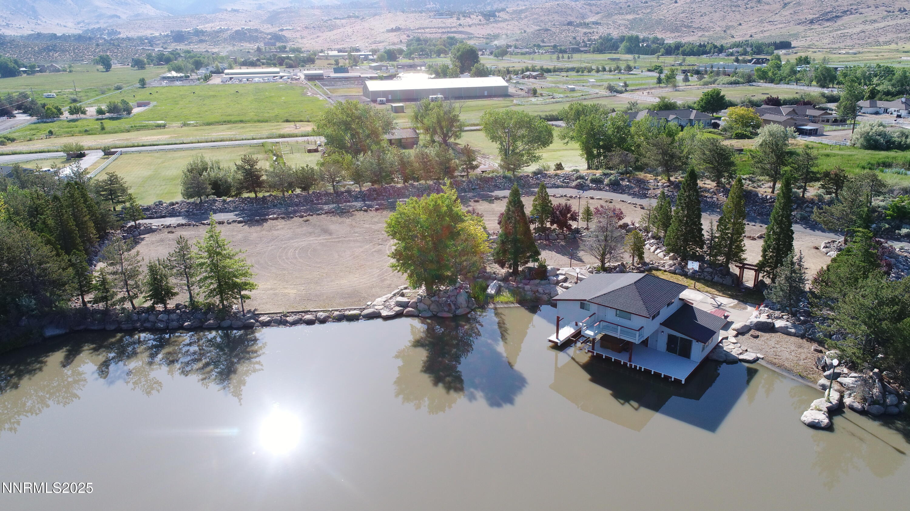95 Hidden Lake Drive Reno, NV 89521 - Photo 25 of 43 an aerial view of lake with residential house and outdoor space