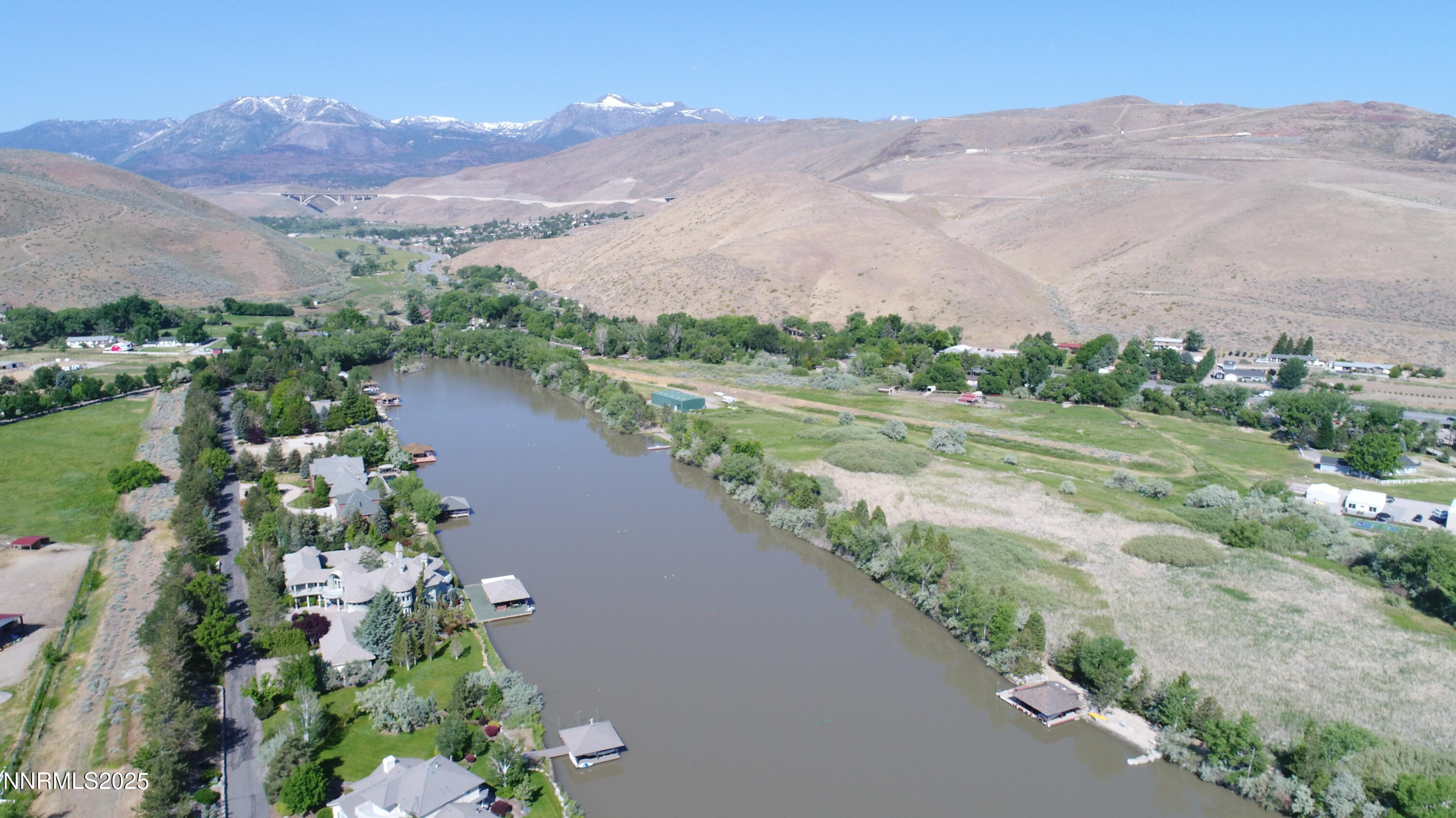 95 Hidden Lake Drive Reno, NV 89521 - Photo 26 of 43 a view of a lake with a mountain in the background