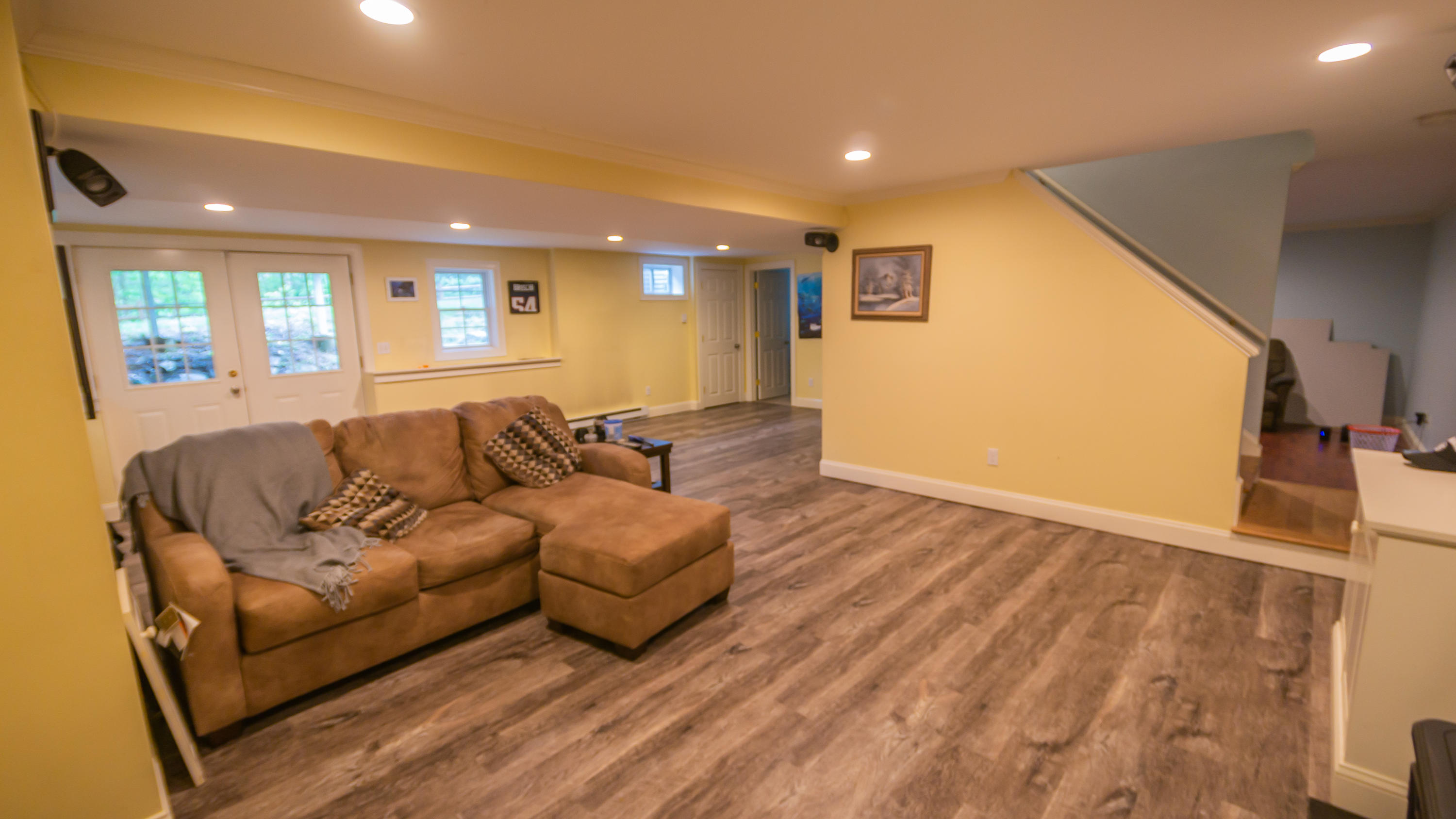 7 Webquish Lane Mashpee, MA 02649 - Photo 15 of 29 a living room with furniture and a wooden floor