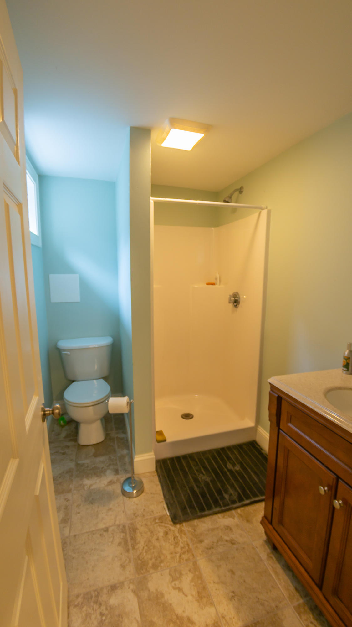 7 Webquish Lane Mashpee, MA 02649 - Photo 17 of 29 a bathroom with a sink and a shower