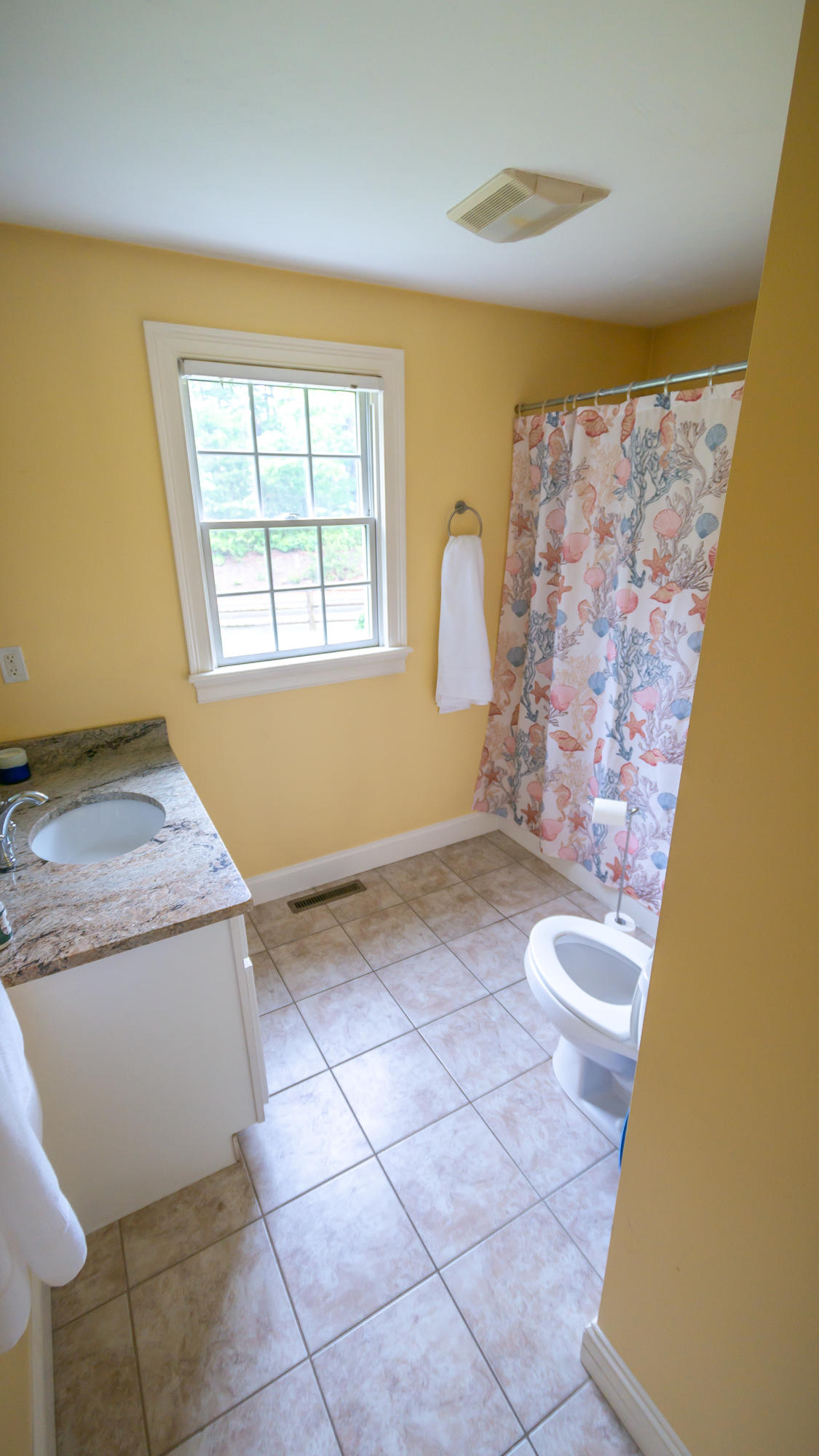 7 Webquish Lane Mashpee, MA 02649 - Photo 19 of 29 a bathroom with a granite countertop sink and a mirror