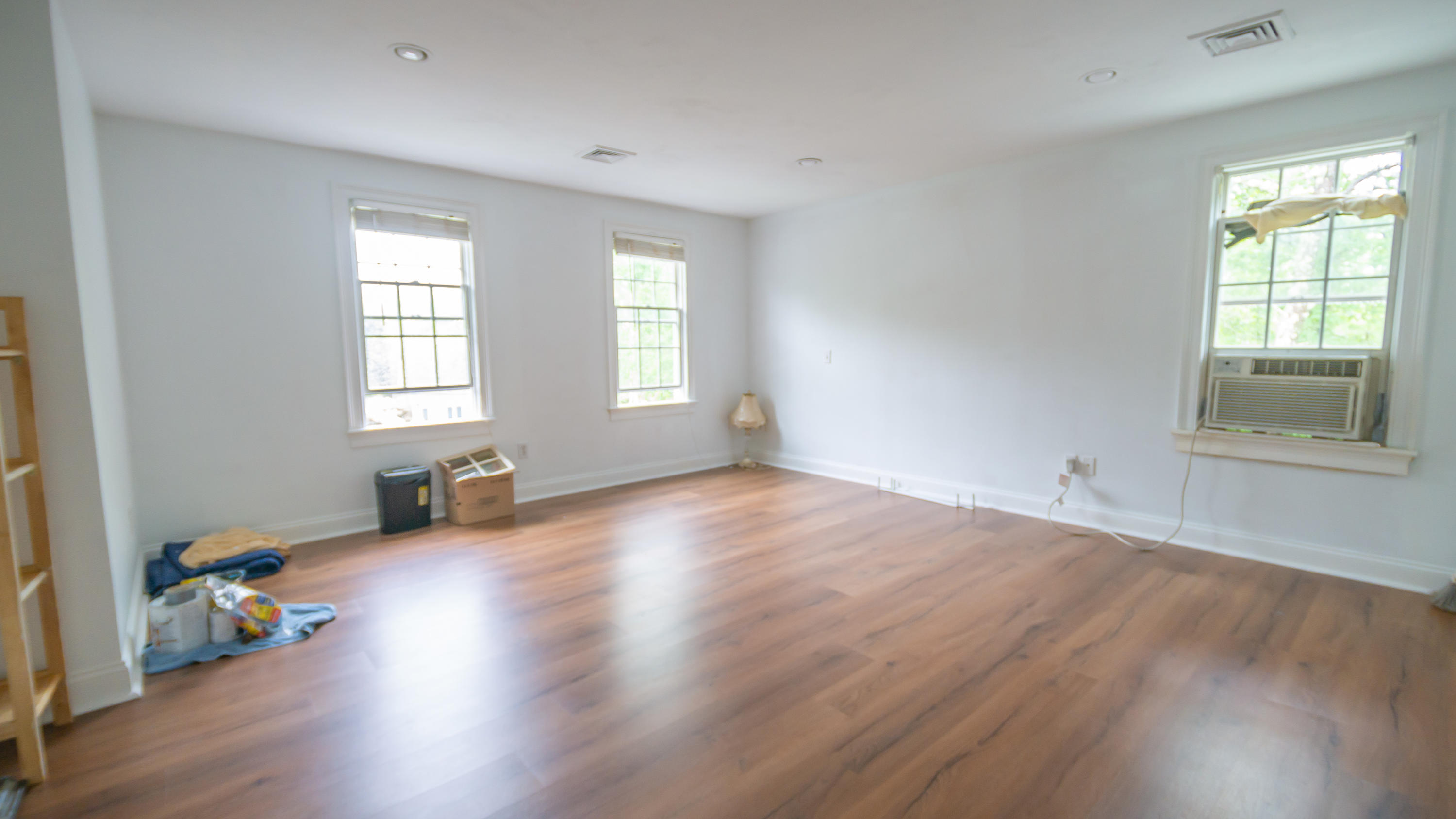 7 Webquish Lane Mashpee, MA 02649 - Photo 22 of 29 an empty room with wooden floor and windows