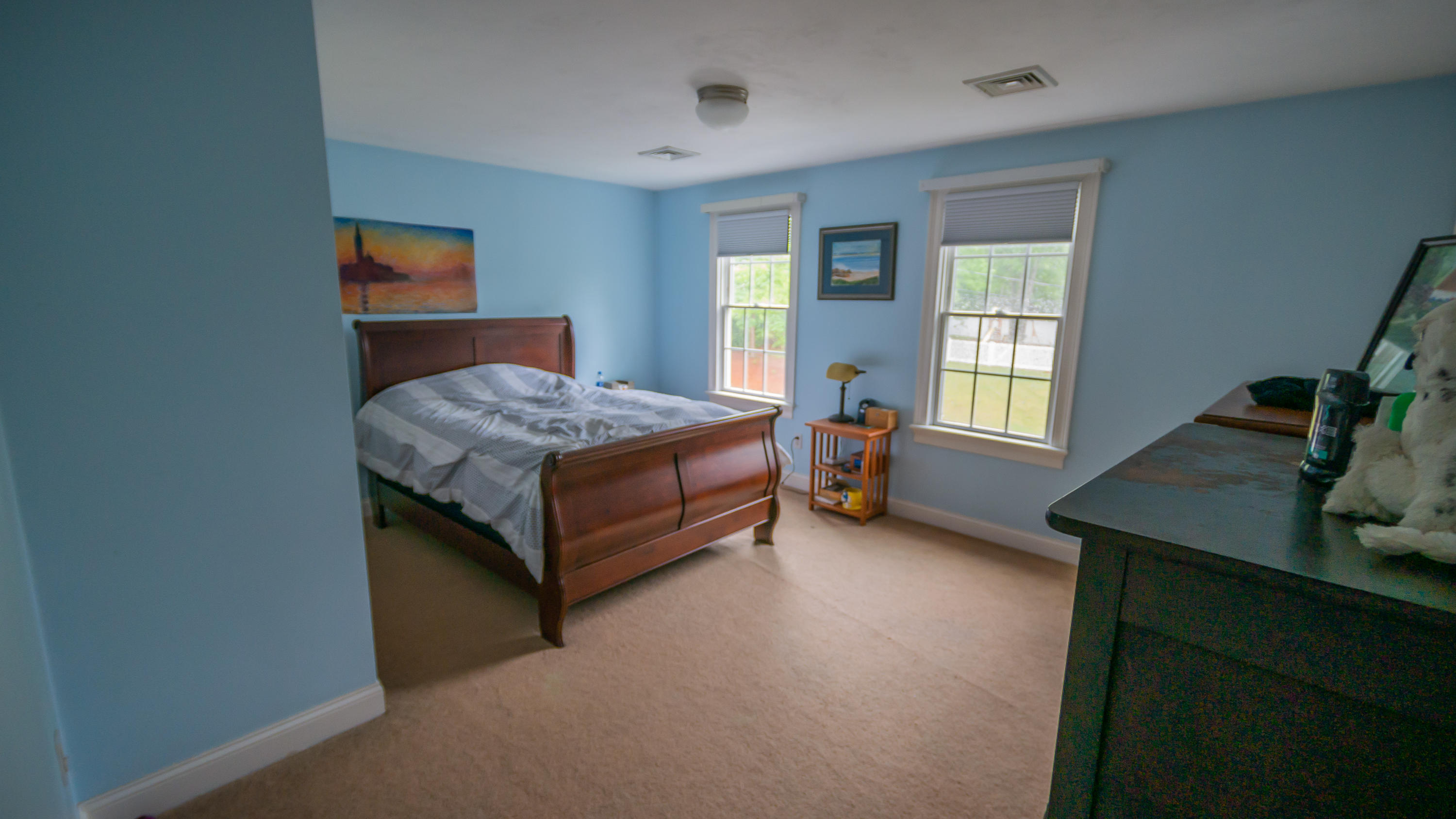 7 Webquish Lane Mashpee, MA 02649 - Photo 25 of 29 a bed sitting in a bedroom next to a window
