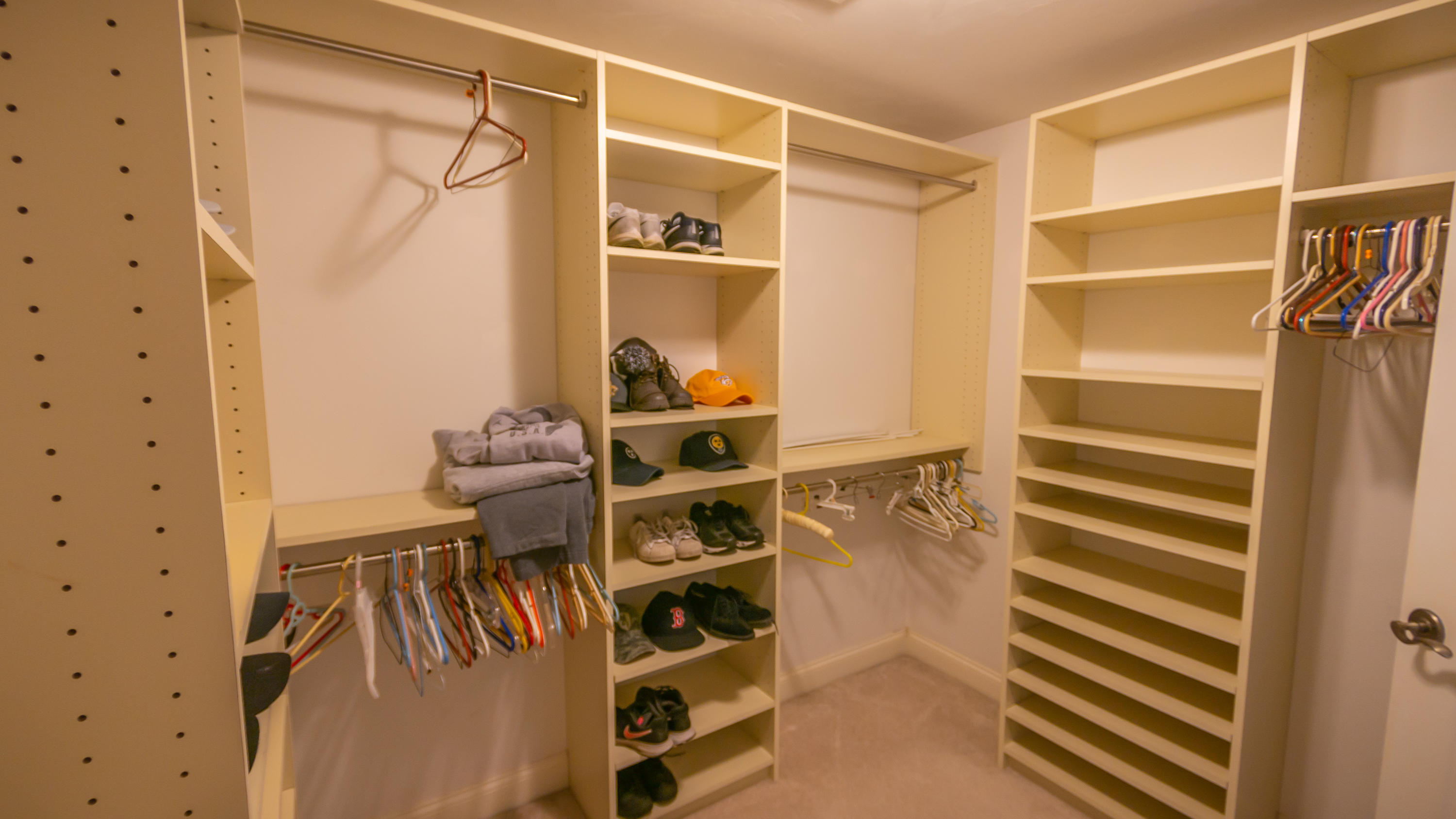 7 Webquish Lane Mashpee, MA 02649 - Photo 26 of 29 a view of walk in closet with clothes and shoes