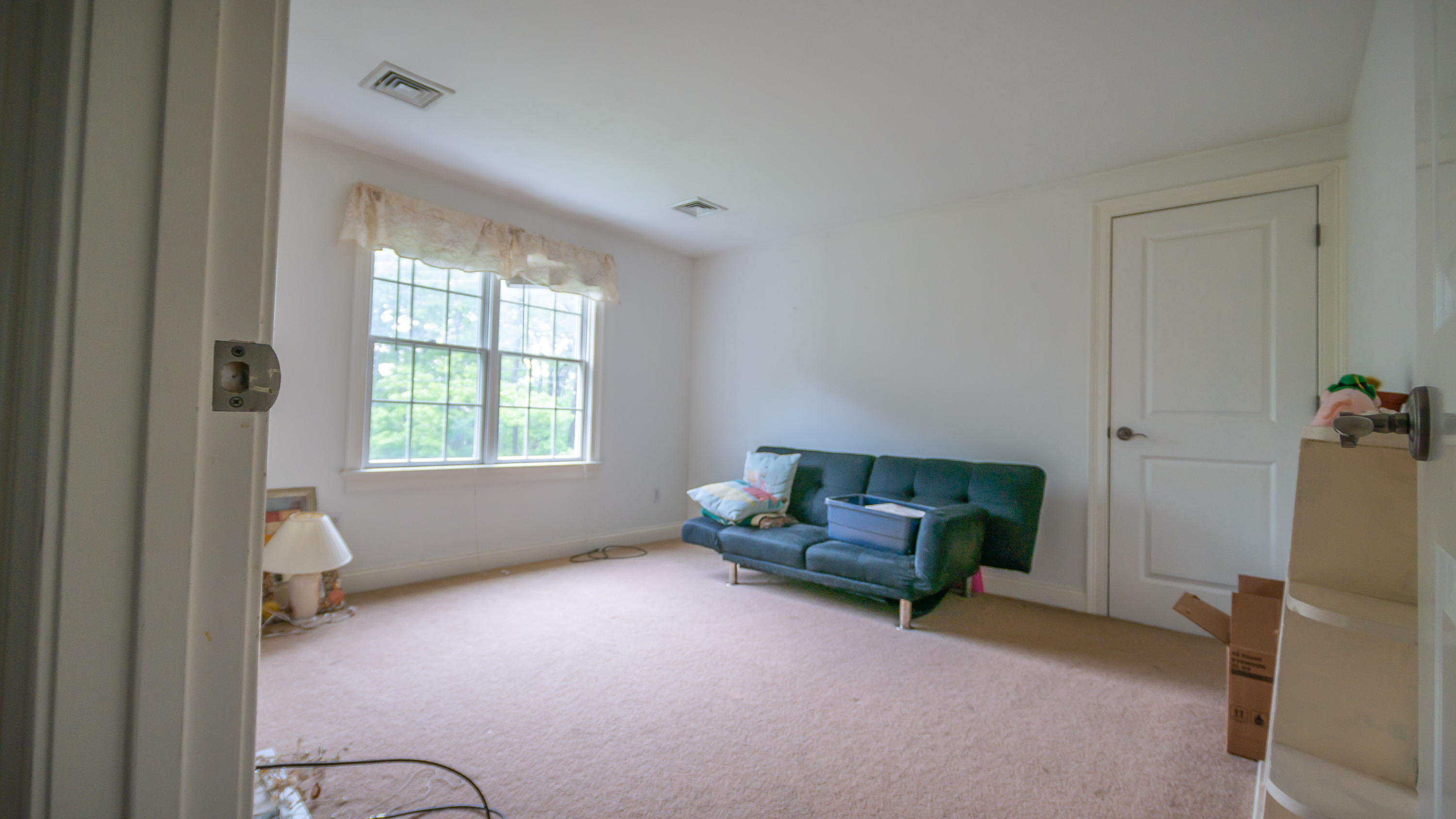 7 Webquish Lane Mashpee, MA 02649 - Photo 29 of 29 a living room with furniture and a window