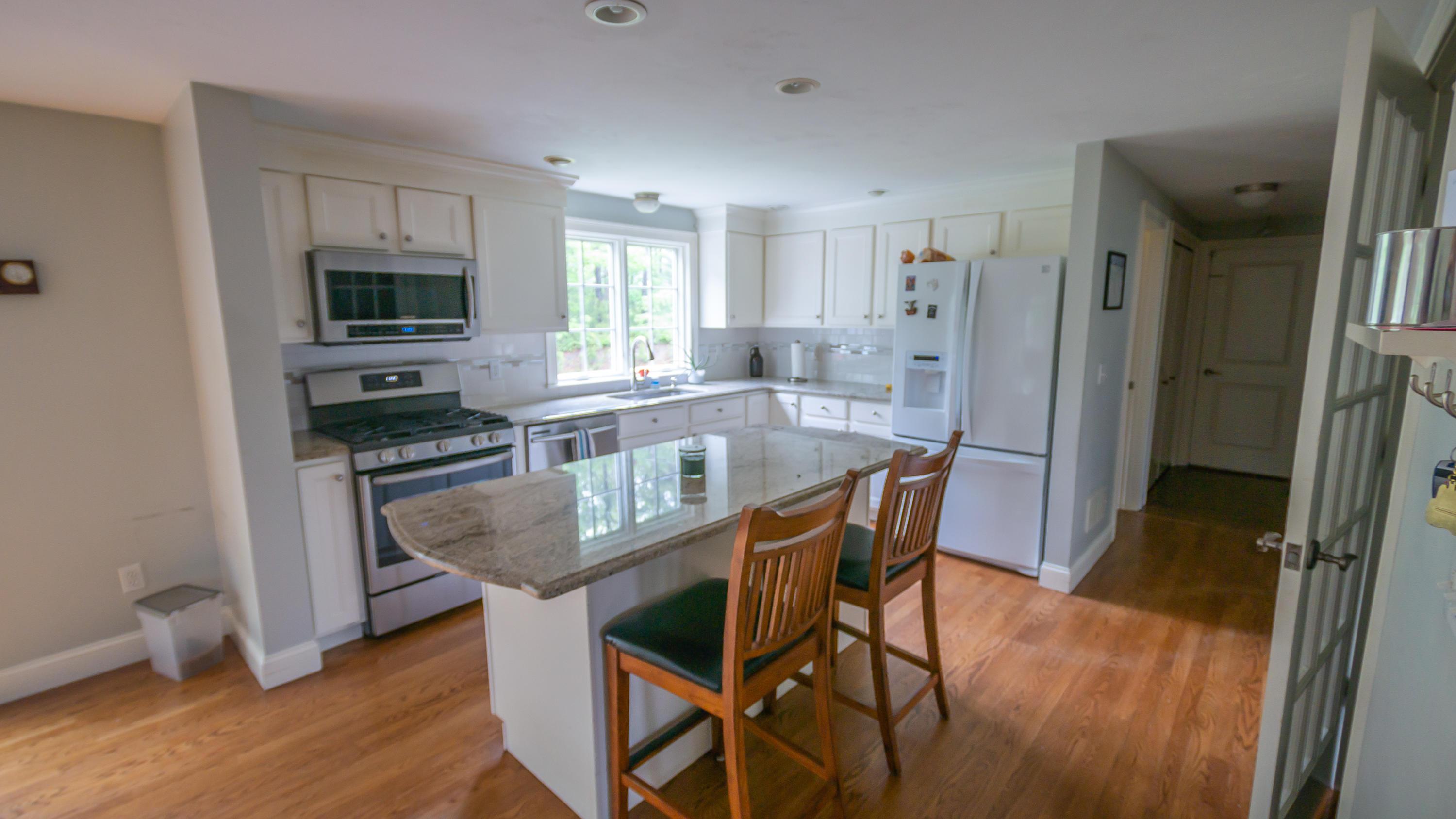7 Webquish Lane Mashpee, MA 02649 - Photo 5 of 29 a kitchen with stainless steel appliances granite countertop a stove a refrigerator and a microwave