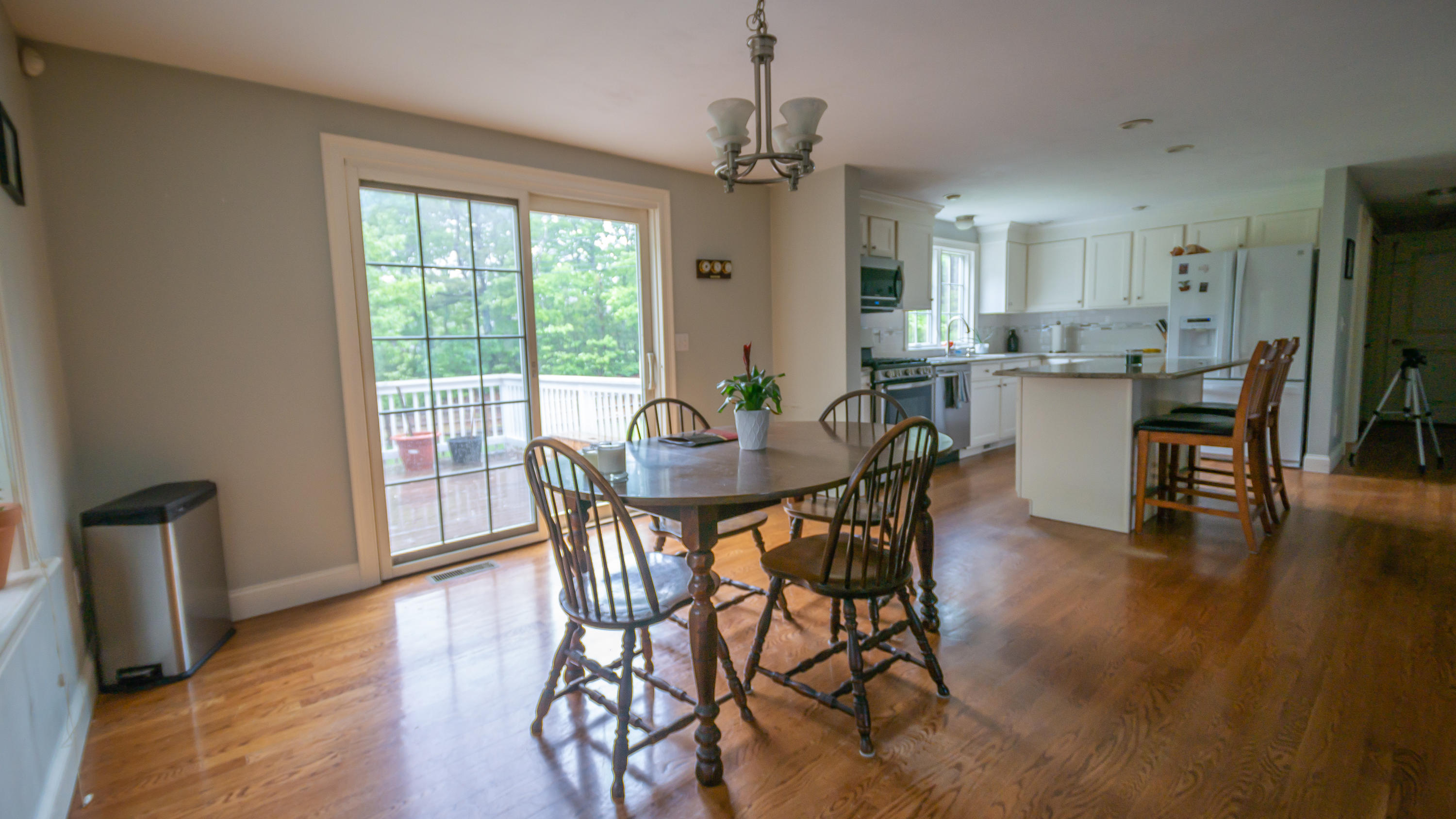 7 Webquish Lane Mashpee, MA 02649 - Photo 7 of 29 a dining room with furniture and wooden floor
