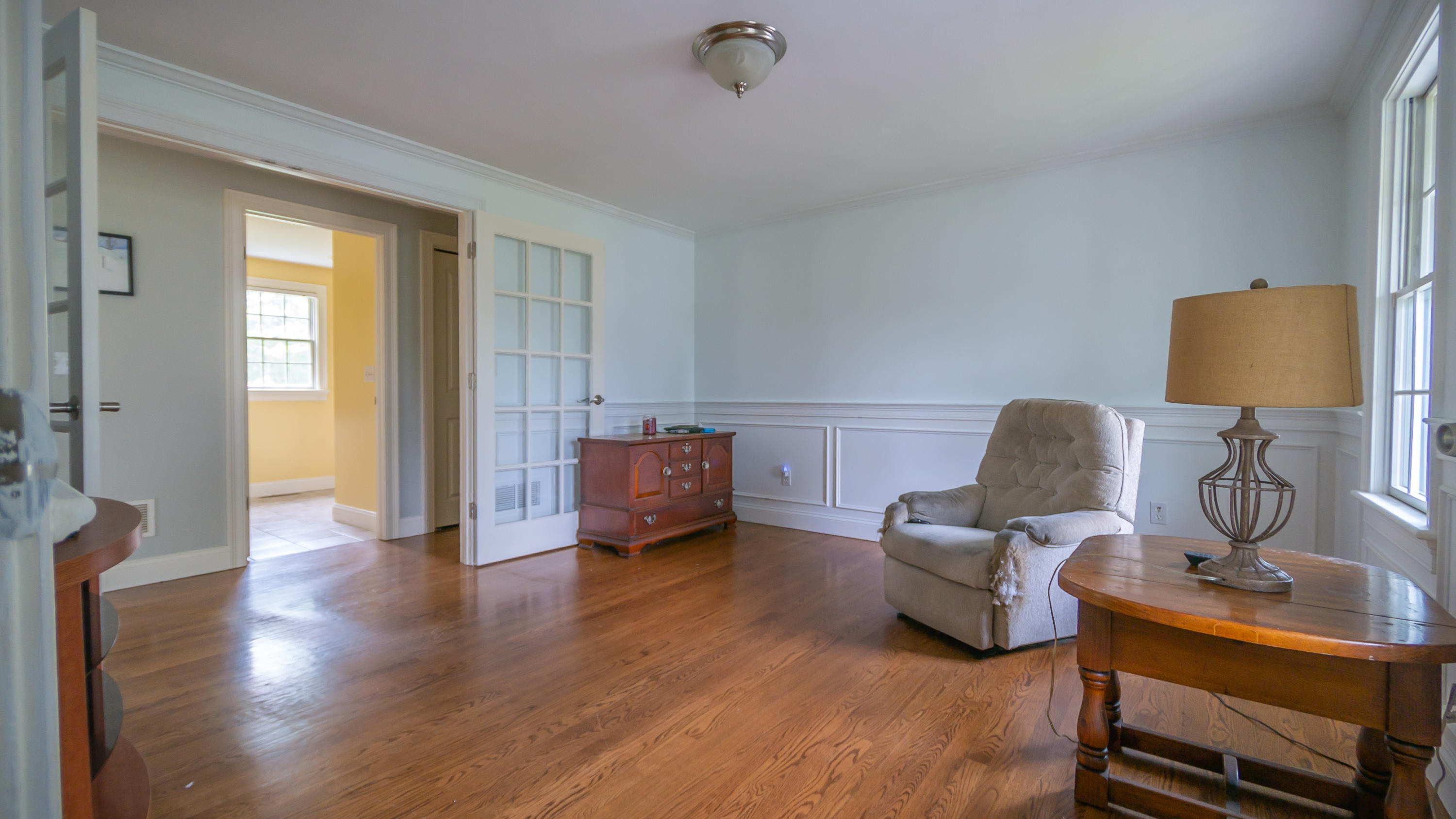 7 Webquish Lane Mashpee, MA 02649 - Photo 8 of 29 a living room with furniture and wooden floor