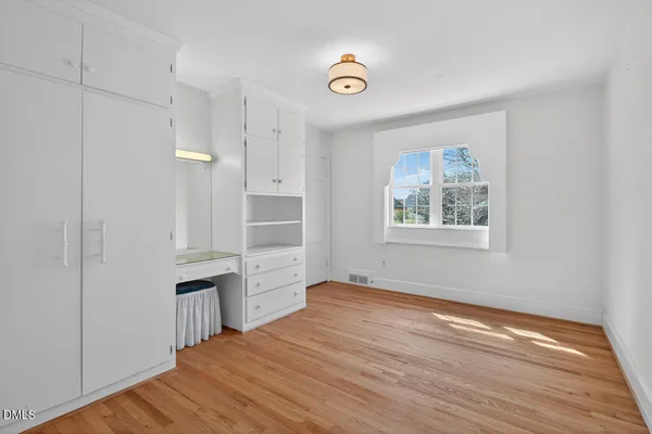 a view of outdoor space with wooden floor