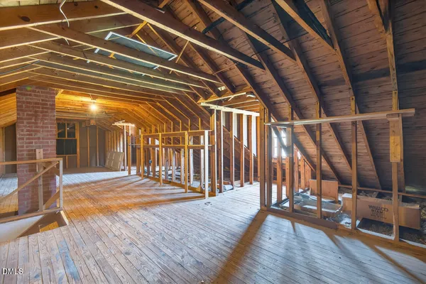a view of porch with wooden floor