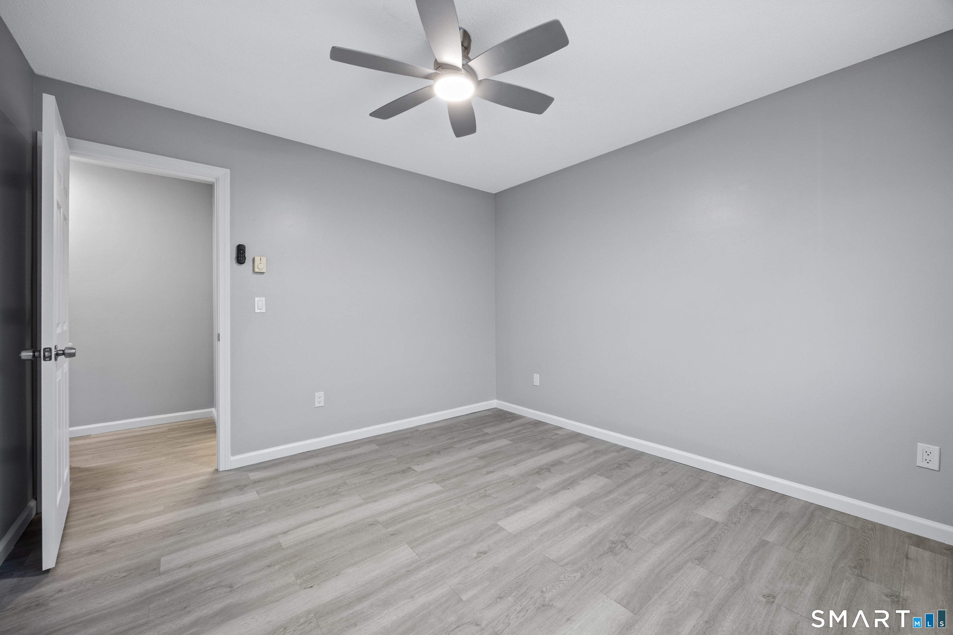36 Sharon Road, Unit 11 Waterbury, CT 06705 - Photo 11 of 13 wooden floor in an empty room