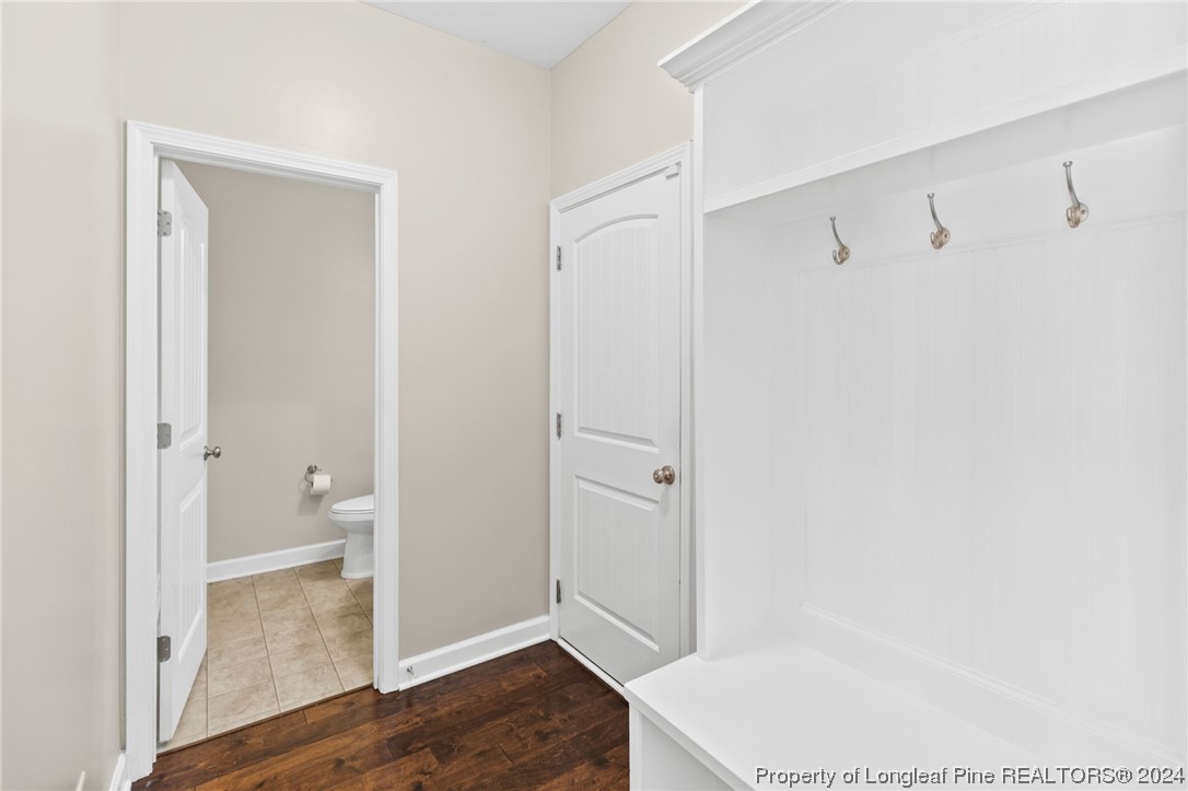 6817 Hunters Den Road Hope Mills, NC 28348 - Photo 21 of 49 a bathroom with a shower and toilet