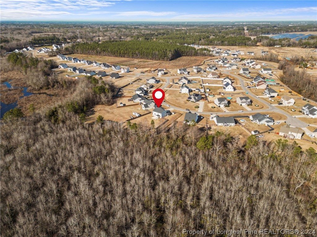 6817 Hunters Den Road Hope Mills, NC 28348 - Photo 46 of 49 an aerial view of multiple house