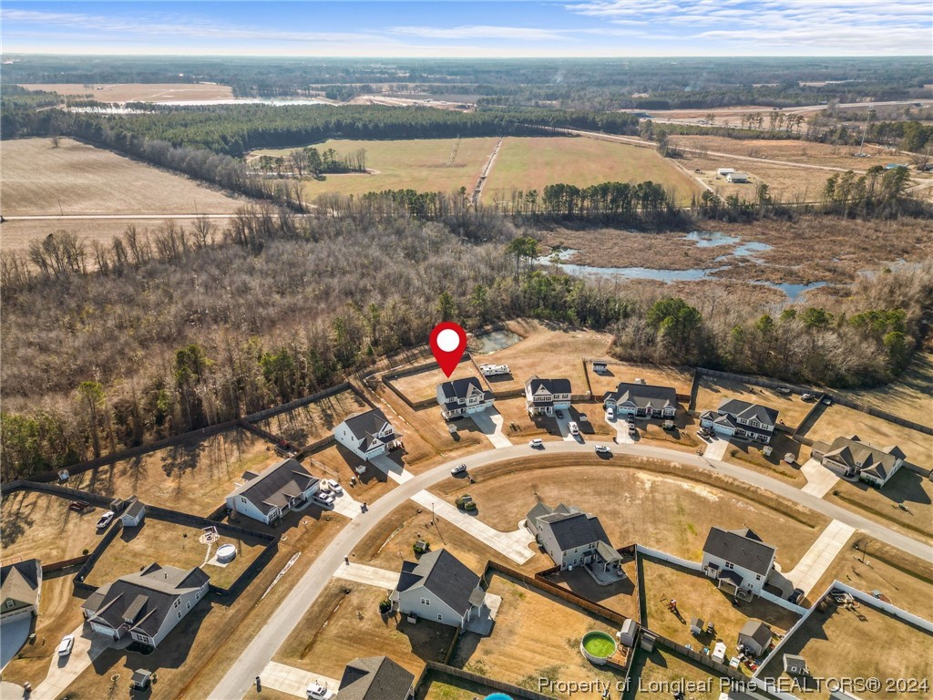 6817 Hunters Den Road Hope Mills, NC 28348 - Photo 47 of 49 a view of a lake with a mountain