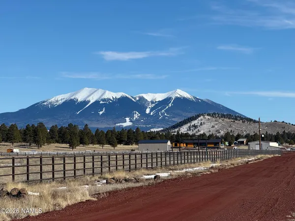 a view of a street with a city view