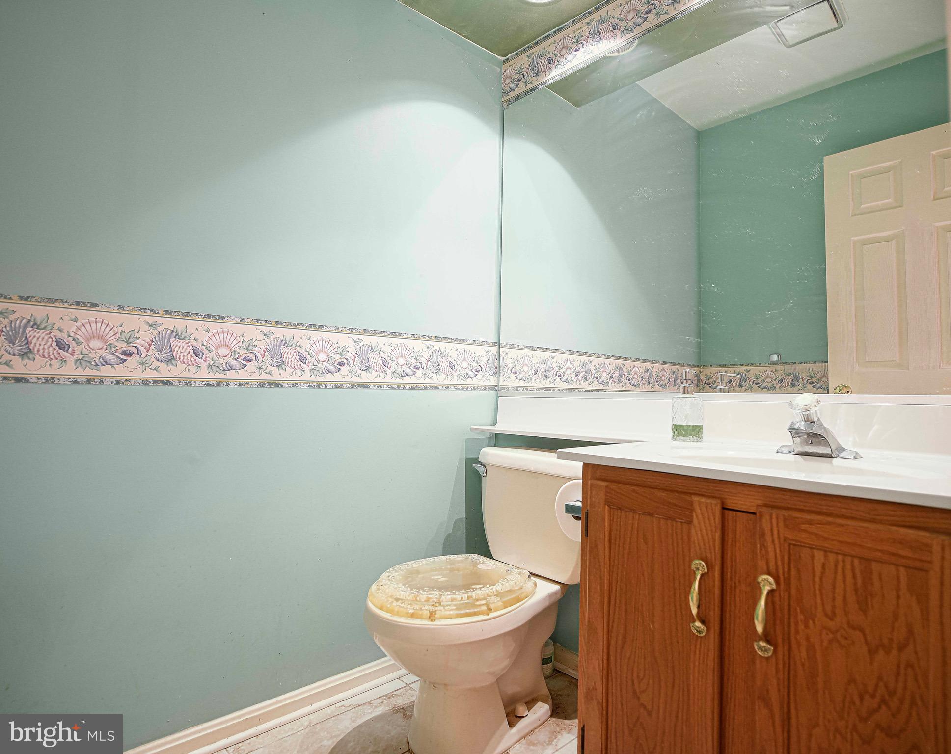 8819 Falcon Ridge Drive Randallstown, MD 21133 - Photo 16 of 38 First Floor Powder Room