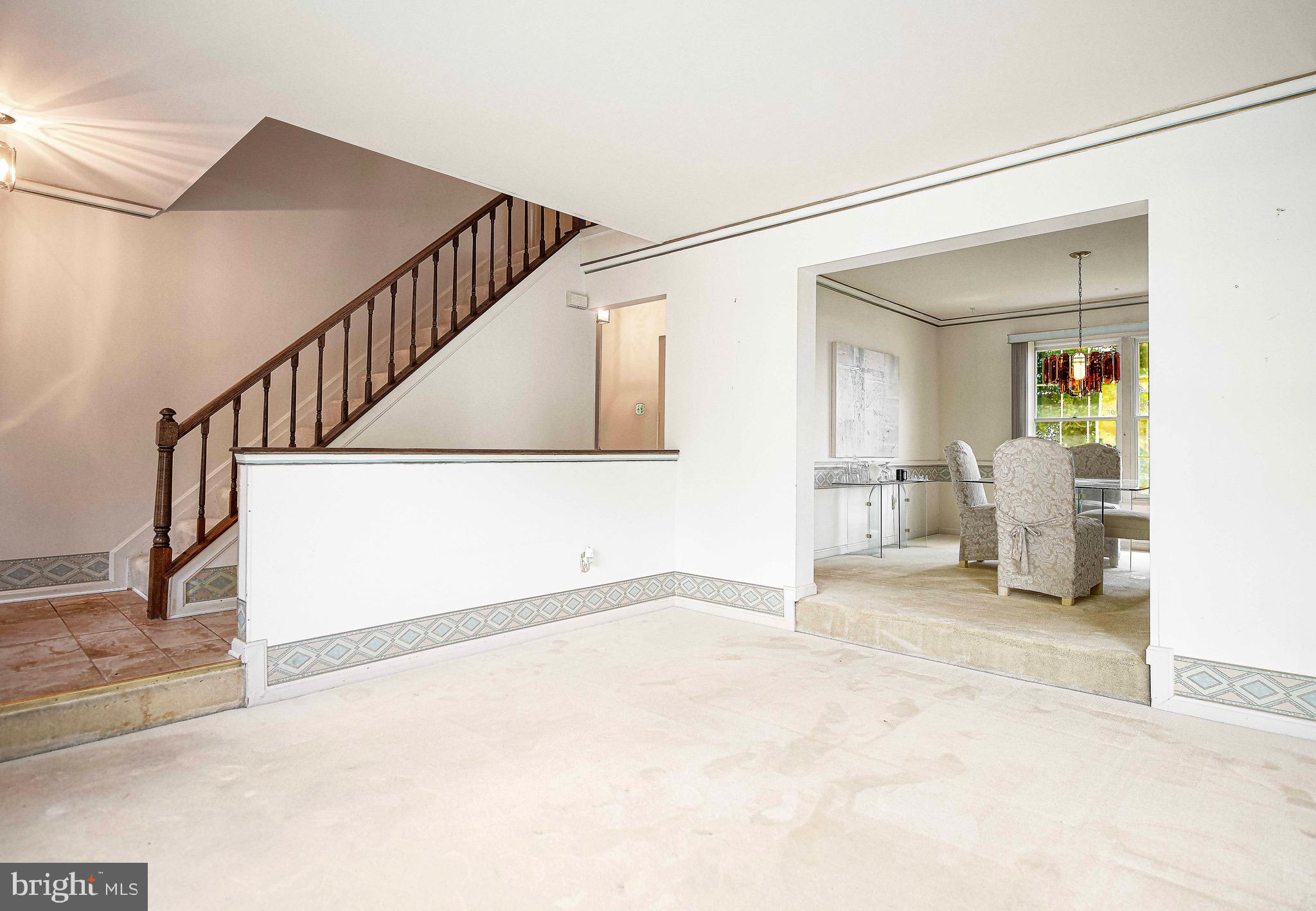8819 Falcon Ridge Drive Randallstown, MD 21133 - Photo 6 of 38 Living Room to Dining Room