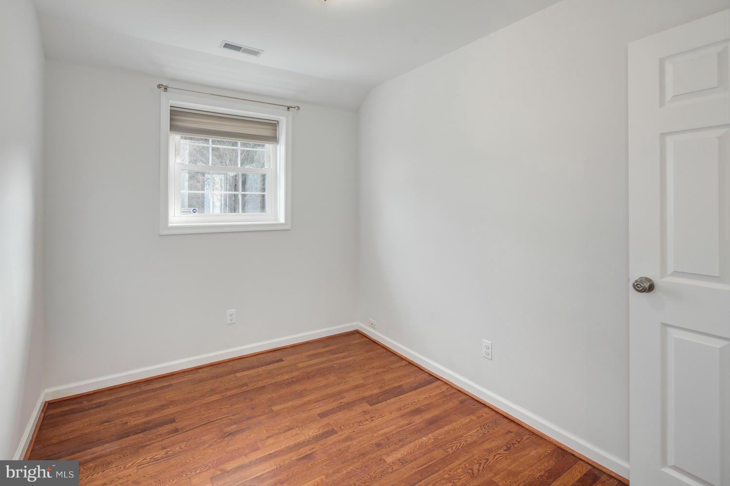 12601 Denley Road Silver Spring, MD 20906 - Photo 26 of 30 wooden floor in an empty room