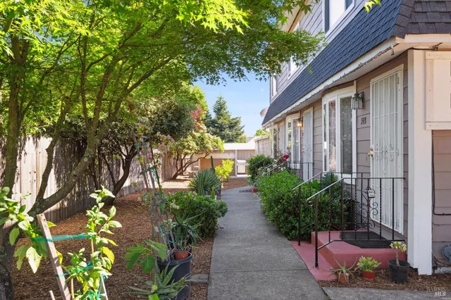 a backyard of a house with lots of green space