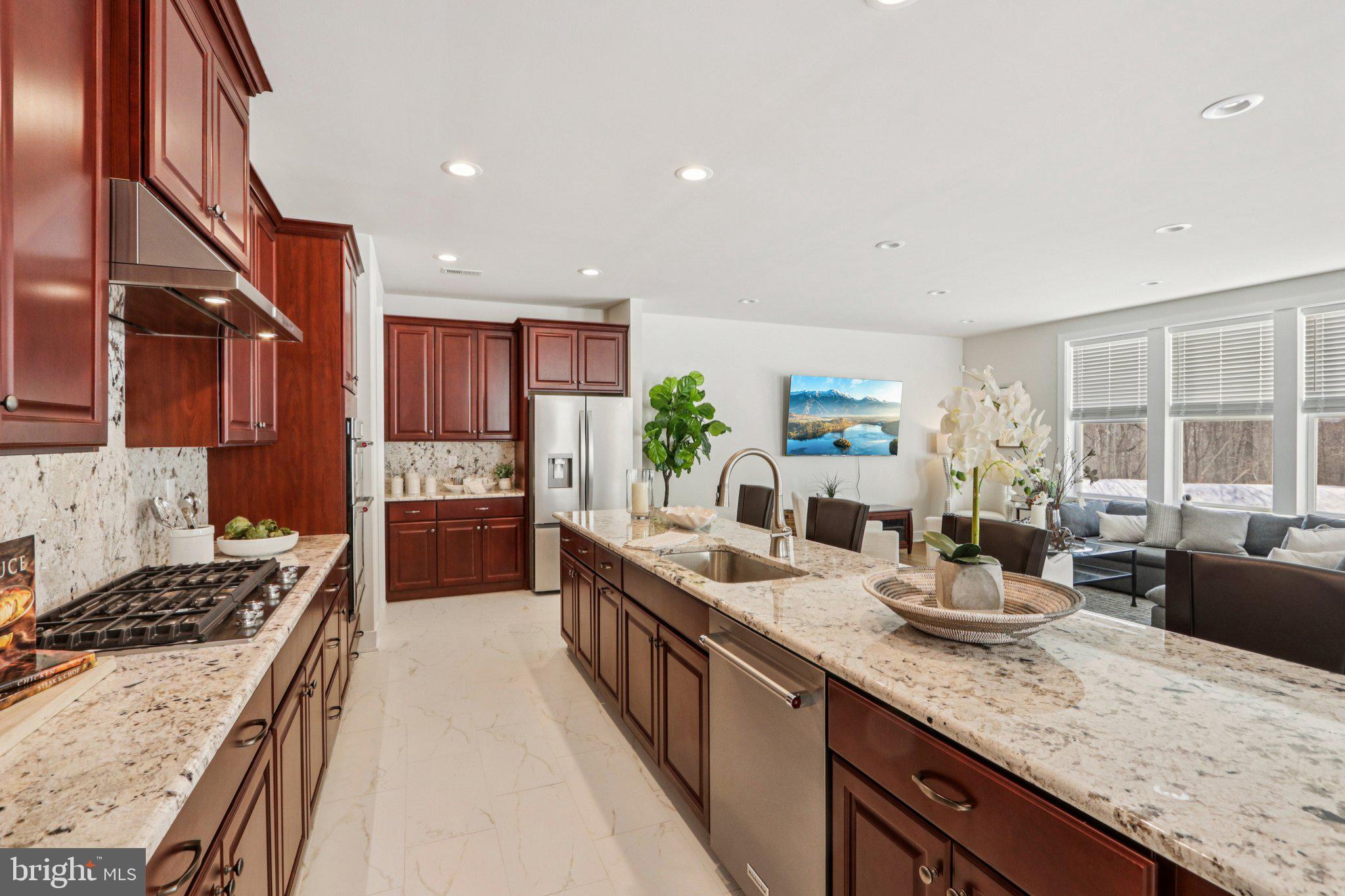 127 Alroy Road Malvern, PA 19355 - Photo 11 of 53 a kitchen with lots of counter top space and living room