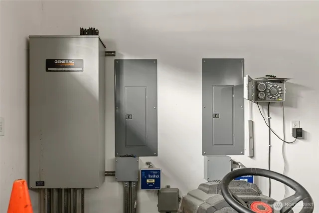 a view of a livingroom with furniture and a flat screen tv