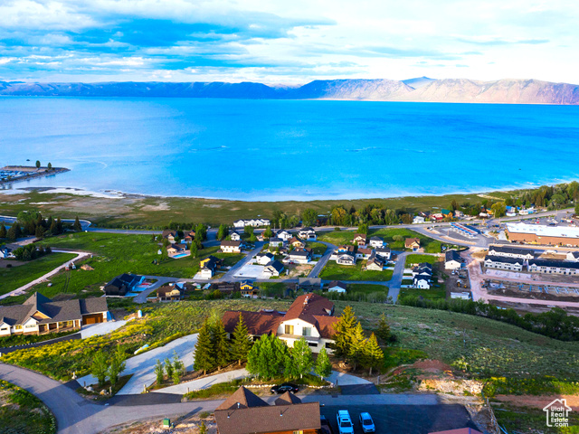 588 Raspberry Patch Road Garden City, UT 84028 - Photo 63 of 74 Aerial perspective of suburban area featuring a water and mountain view