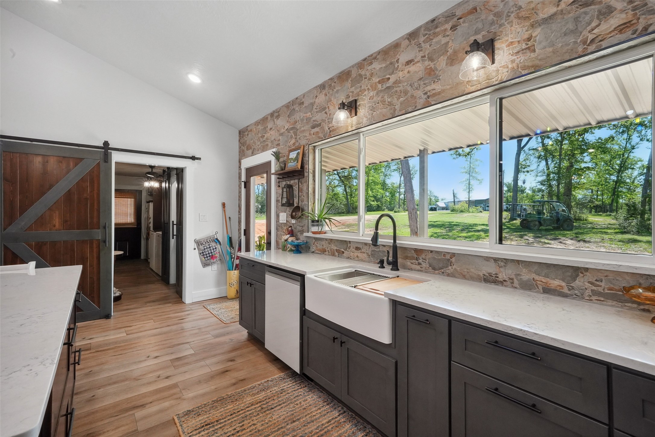 4924 County Road 4263 Marquez, TX 77865 - Photo 13 of 50 a kitchen with a sink and wooden floor