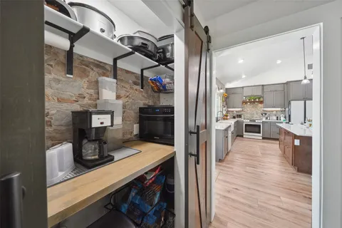 a view of a kitchen and dining room