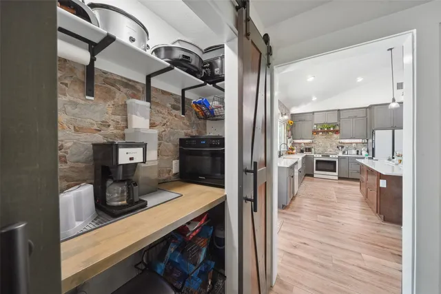 a view of a kitchen and dining room