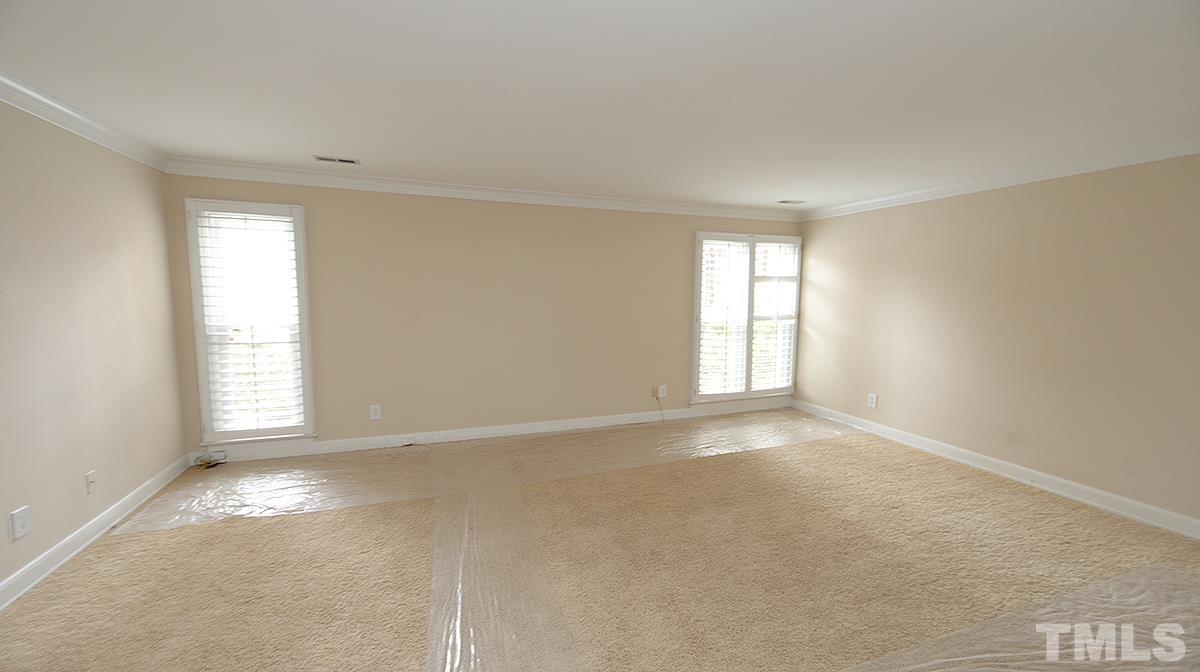 2203 Landings Way Raleigh, NC 27615 - Photo 13 of 22 an empty room with windows