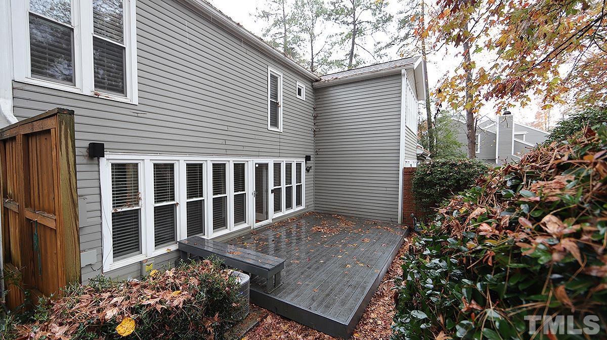 2203 Landings Way Raleigh, NC 27615 - Photo 20 of 22 a view of a house with a flower garden