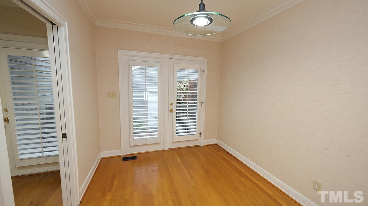 2203 Landings Way Raleigh, NC 27615 - Photo 7 of 22 an empty room with a window