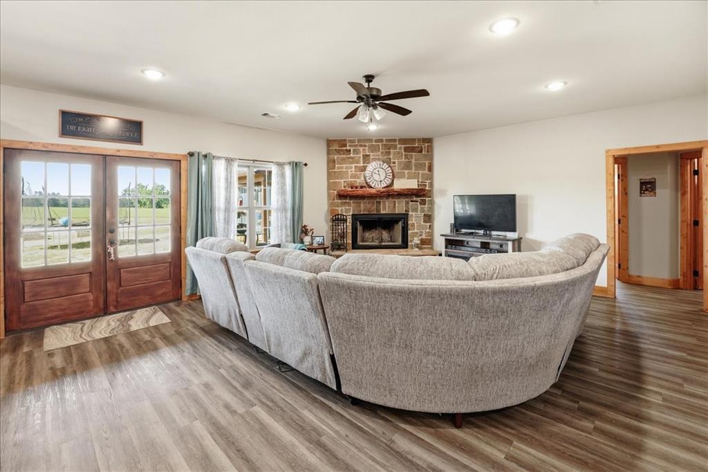 971 Bamboo Road Big Sandy, TX 75755 - Photo 11 of 40 a living room with furniture and a fireplace