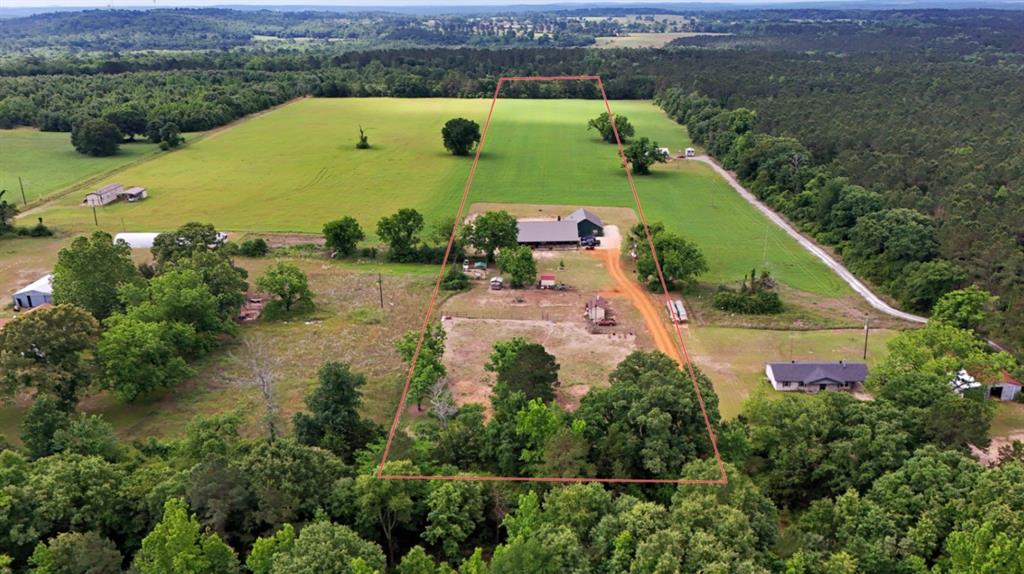 971 Bamboo Road Big Sandy, TX 75755 - Photo 2 of 40 an aerial view of a house with a lake view