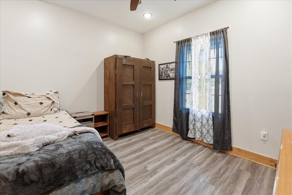 971 Bamboo Road Big Sandy, TX 75755 - Photo 24 of 40 a bedroom with a bed and a closet